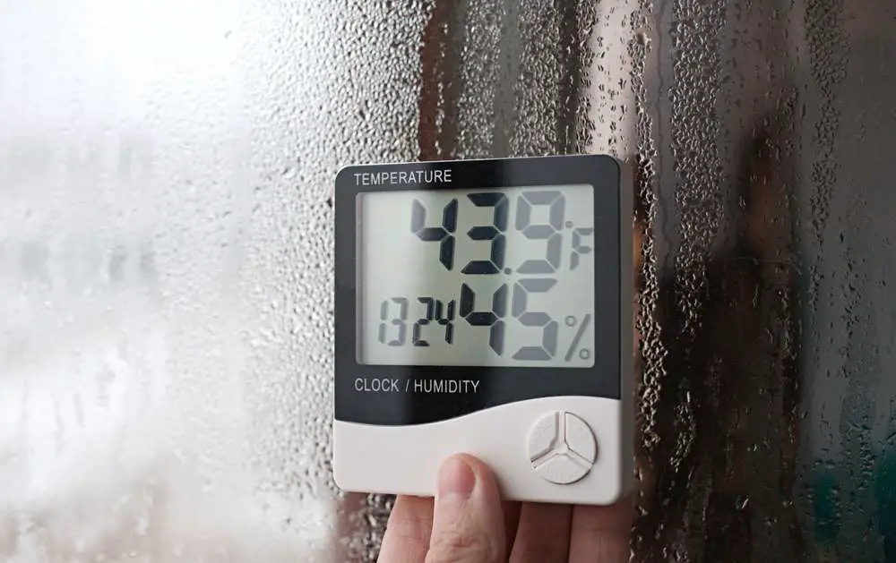 A hygrometer testing humidity in a room