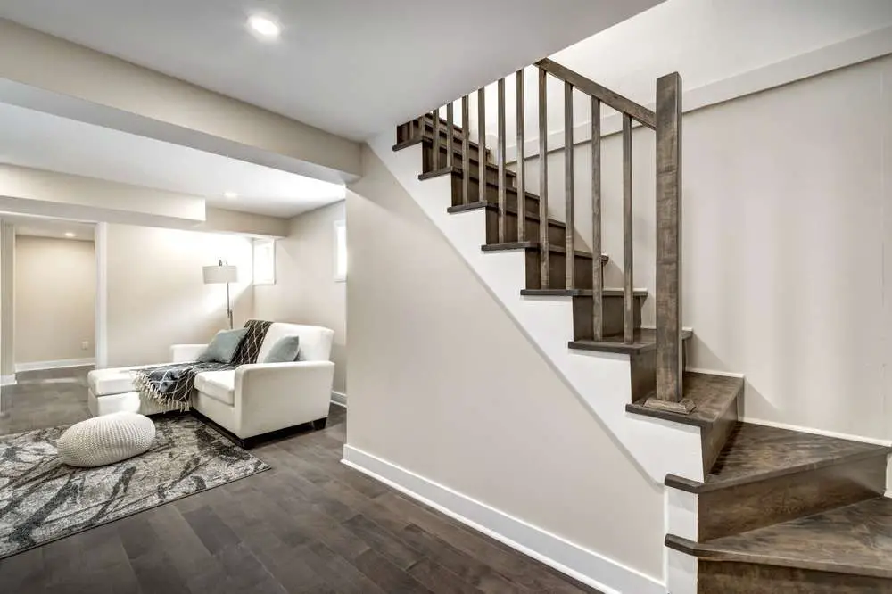 Image showing stairs and couch in a finished basement.